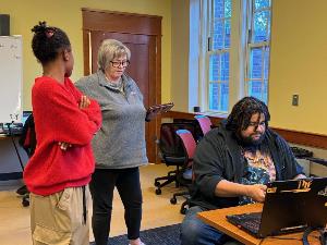 Mentors help student with computer issues